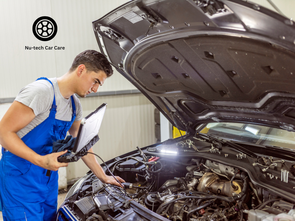 Professional mechanic conducting preventative vehicle maintenance